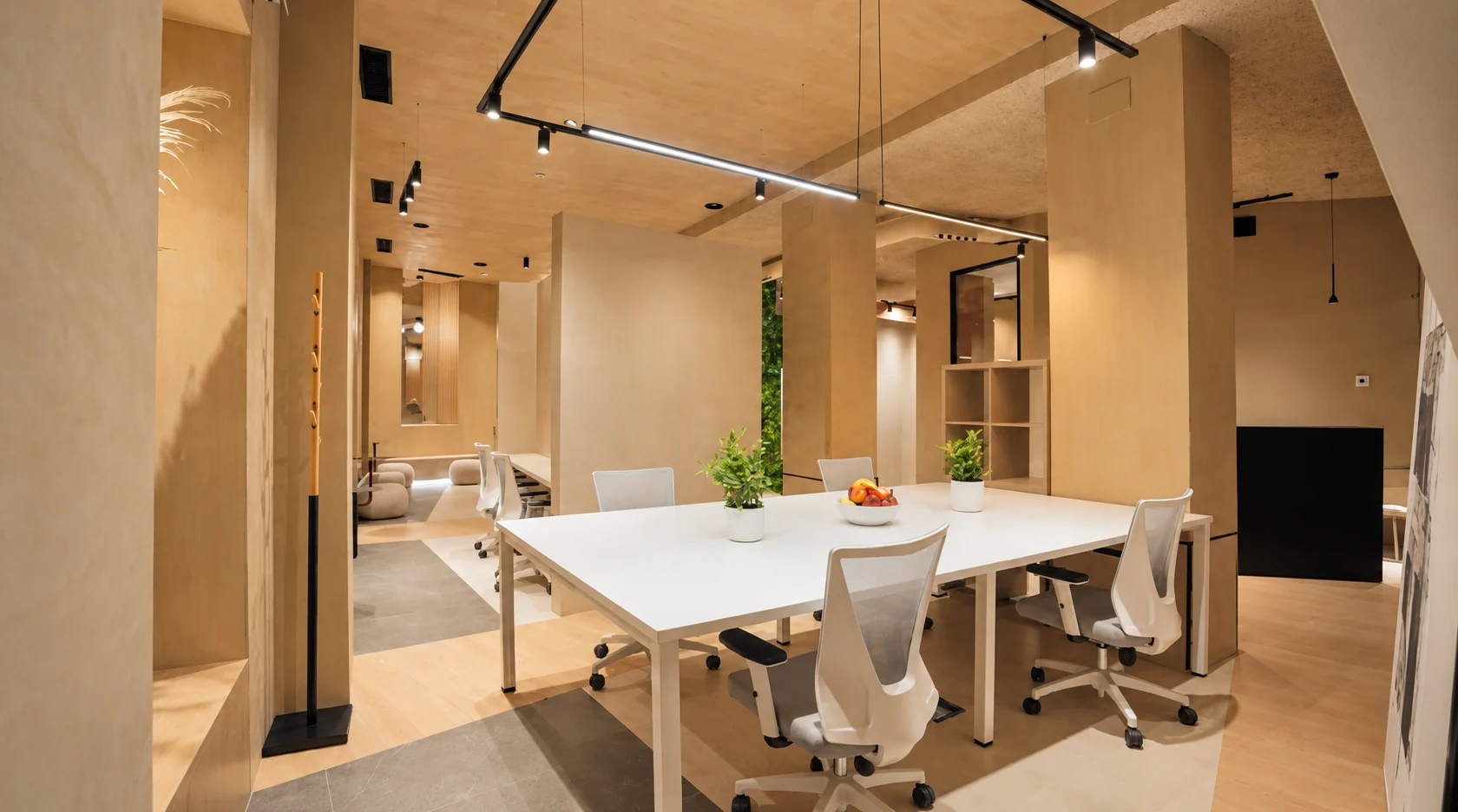 Mesa compartida y puestos de trabajo en The Squab Coworking